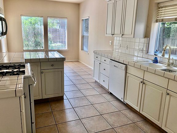 kitchen sink, gas stove, dishwasher