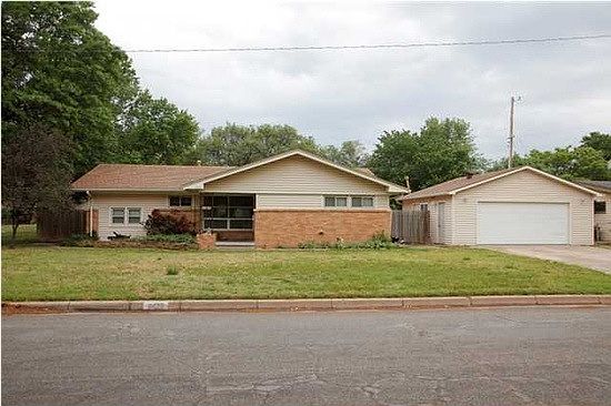 On a corner lot! Across from a beautiful park!