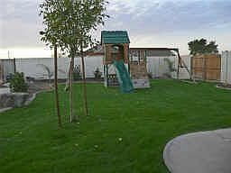 Large Play Area For Children With Fully Landscaped Yard