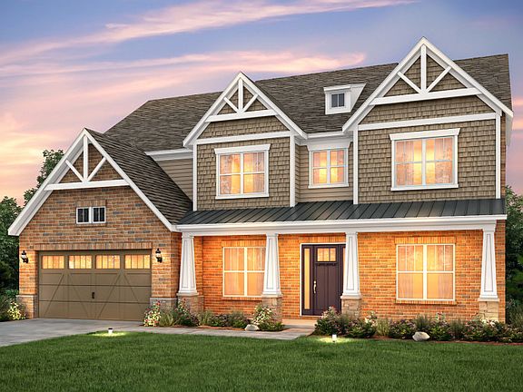 Townsend Exterior features brick, stone accents, shakes and covered front porch