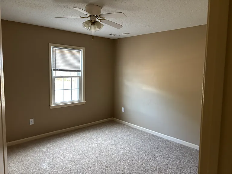 1 of 3 upstairs bedroom with new carpet