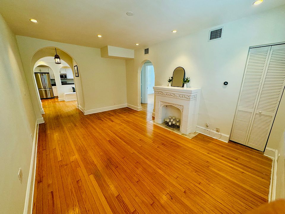 Beautiful wood floors & recessed lighting through out the unit.