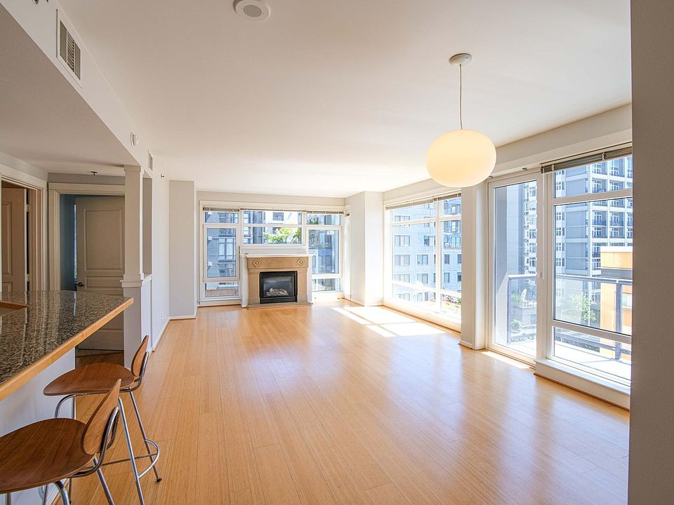 Living and dining area - very bright with south and west facing windows