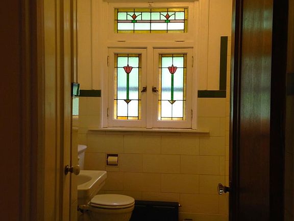 Stained glass windows in bathroom