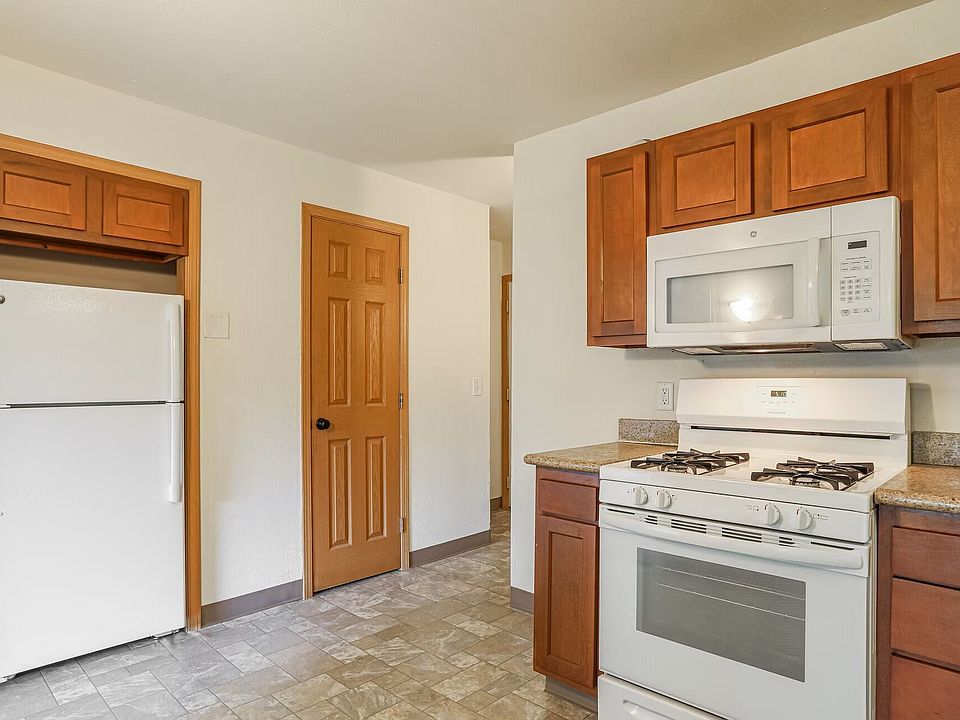 Kitchen and broom closet/pantry.