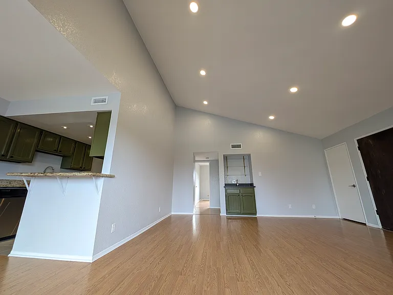 Living area with vaulted ceiling