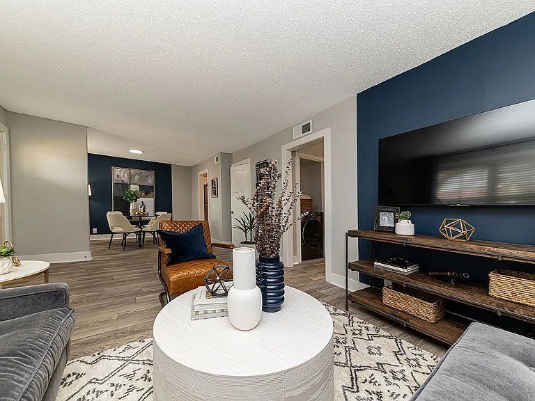 Spacious living room with hardwood-style flooring