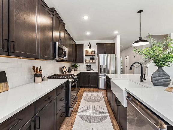 Kitchen with island and pendant lighting