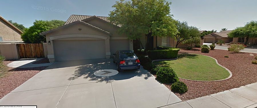 Front House. Three car garage.