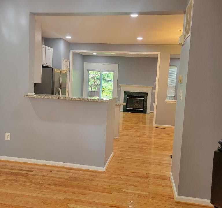 Main Floor (Looking from Living Room into Kitchen & Family Room)