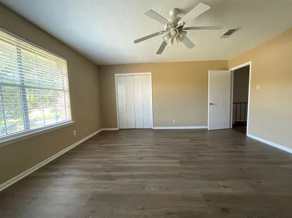 fully renovated Large 2 Bedroom and 2 Bath Apartment with 2 car garage and a privet fenced Back yard