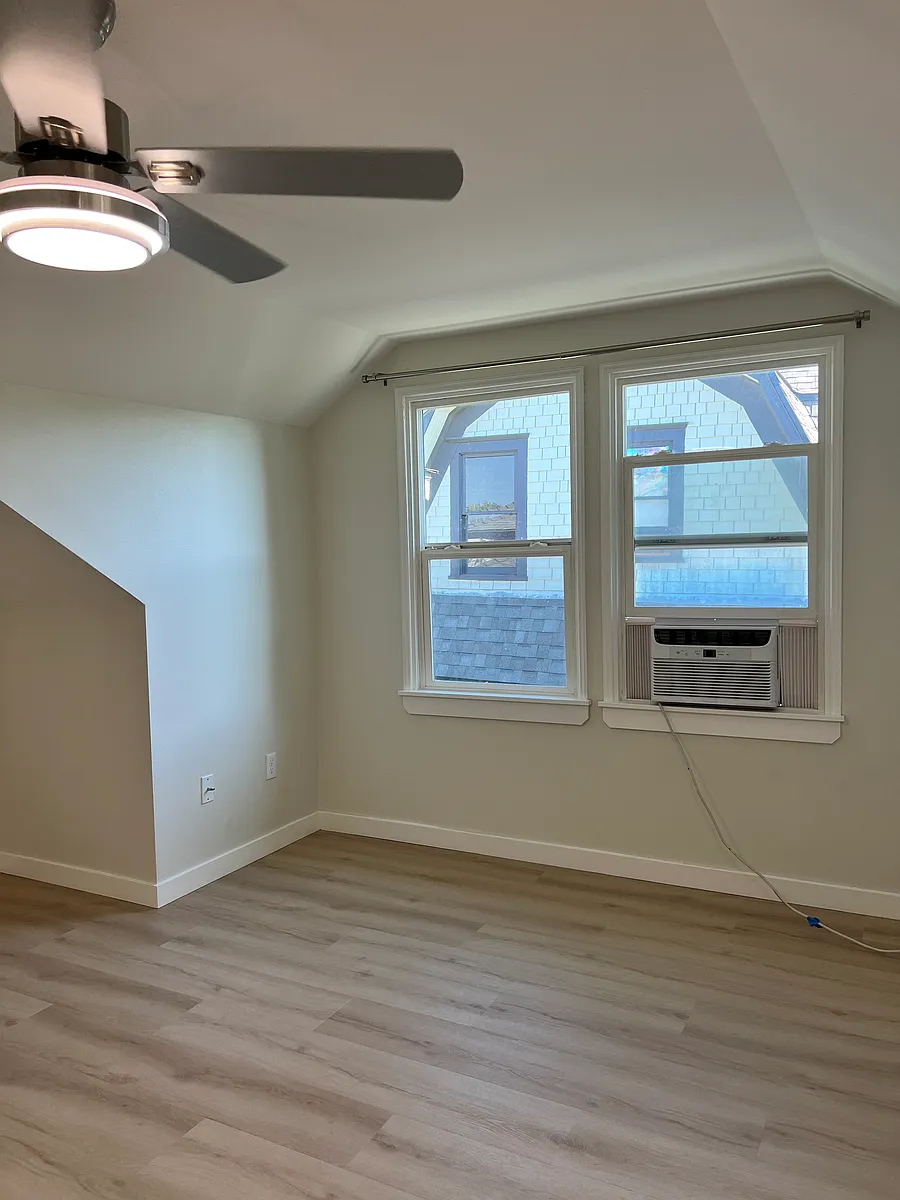 Living room with window AC unit! - 622 N State St #A