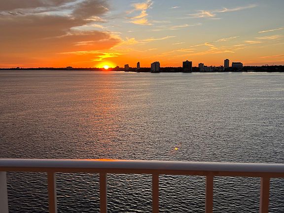Westerly sunset view from living rm and balcony patio.