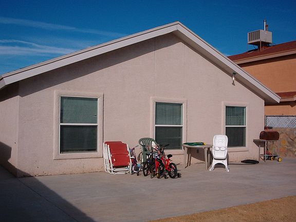 Cement slab in back is level with floor in living area