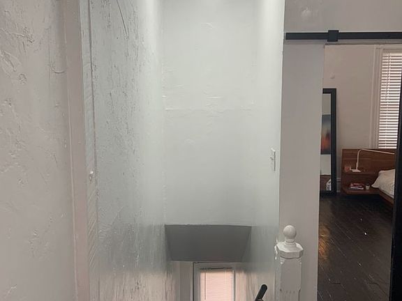 Entryway, showing access to bedroom