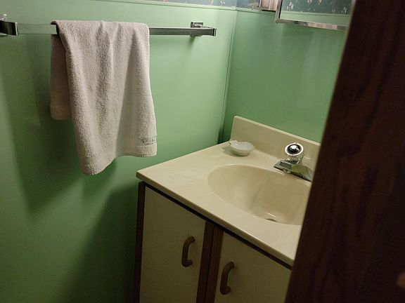 powder room by kitchen