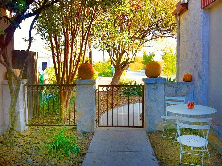 Charming and private side and back yard.