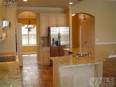 Customized kitchen with granite, exquisite tile work and stainless appliances!