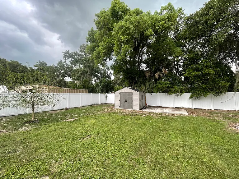 shed in backyard, concrete pad and lots of space