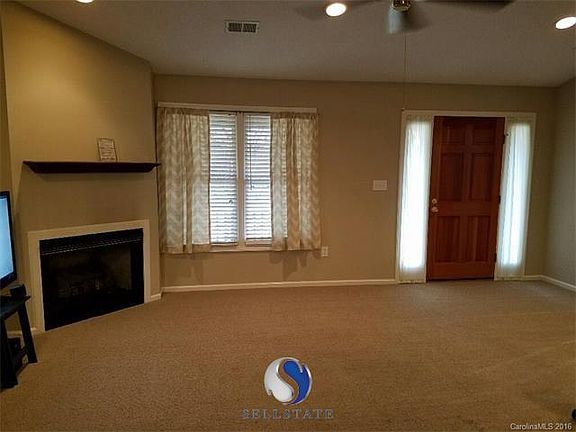 Large Great Room With Vaulted Ceiling and Gas Log Fireplace