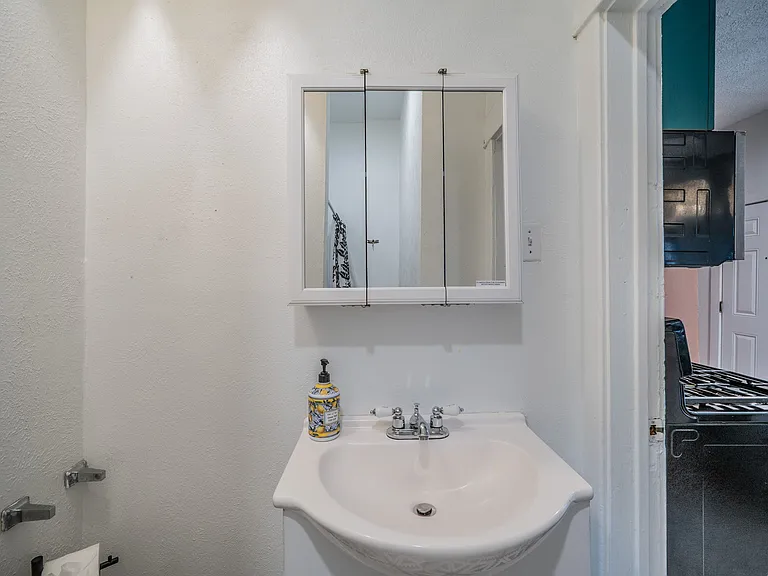 A clean and modern vanity with integrated storage.