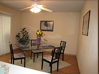 Large dining room open to the kitchen. Sliding glass doors leads to patio