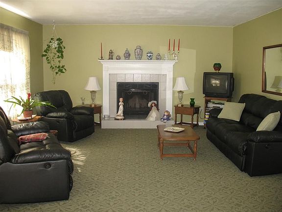 Family Room with Wood Burning Fireplace