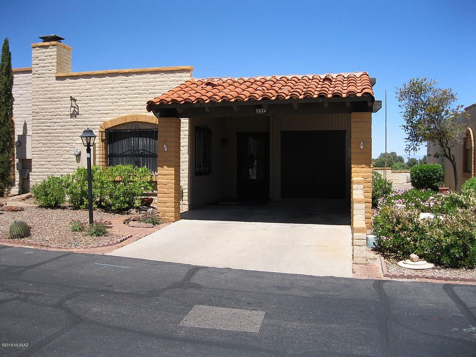 One-car carport plus golf cart area