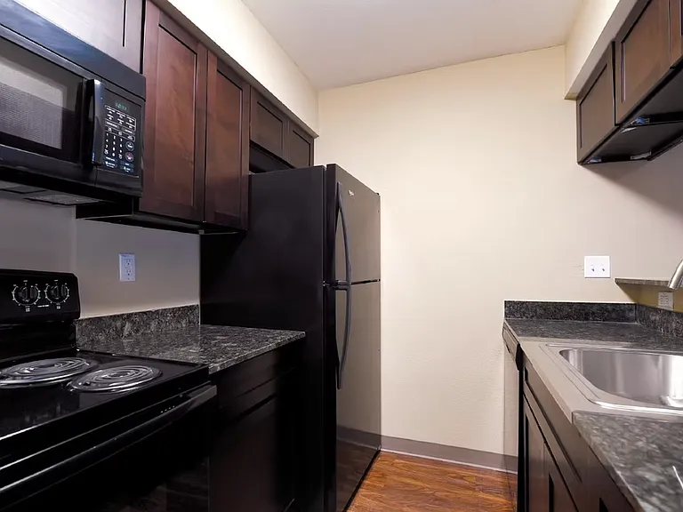 Select homes feature upgraded cabinetry, modern appliances, and comfortable cooking spaces.
