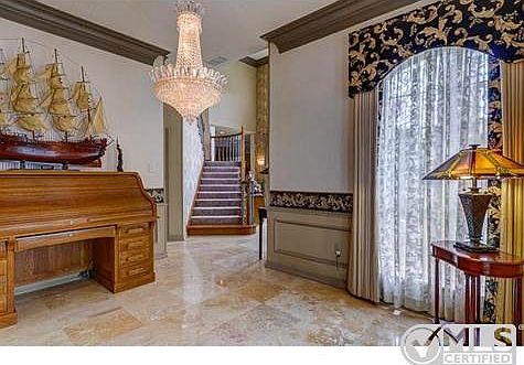 This is the Formal Dining,already void of furniture except a lar