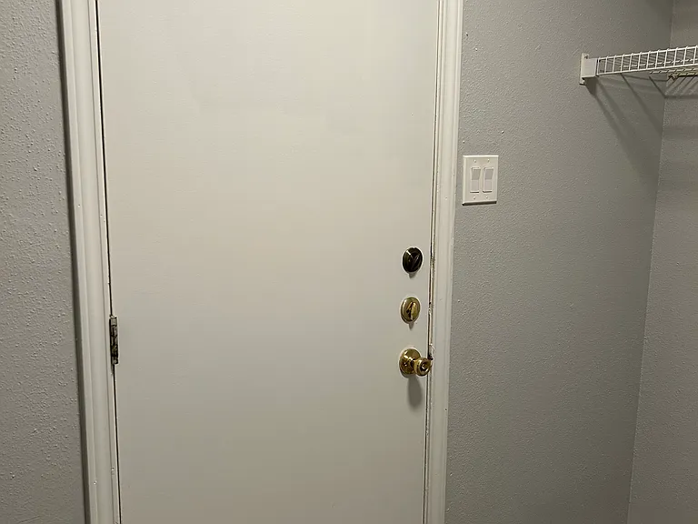 Door in laundry room leading to the garage.