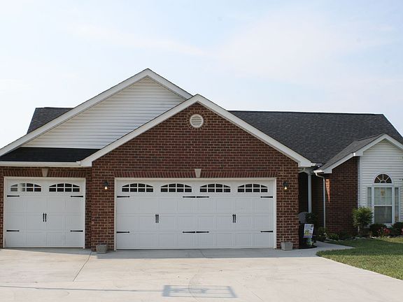 3 car garage with carriage style doors