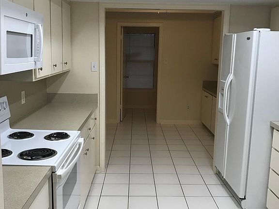 This kitchen is expansive! It overflows into a breakfast nook and one of 2 laundry rooms.