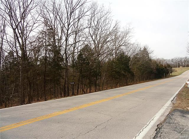 Highway V frontage of 8.7 acres looking West.
