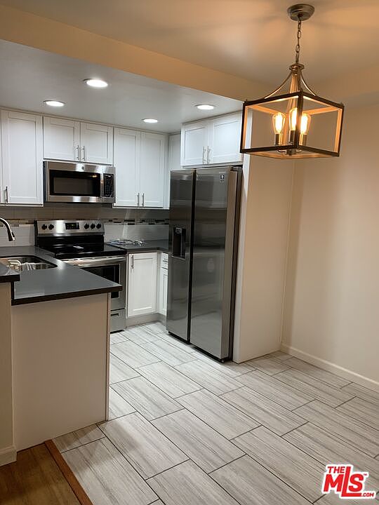 1st image of 4810 S La Brea Ave #110