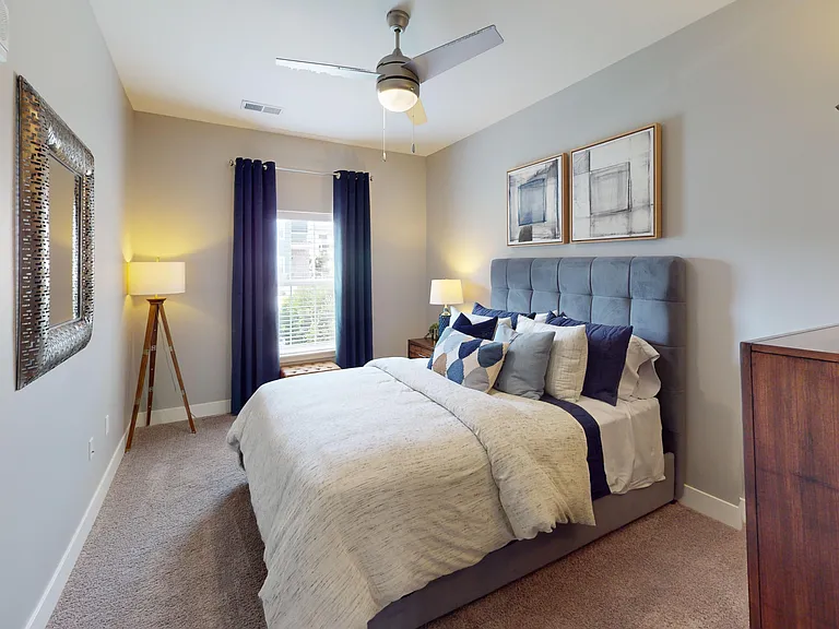 Spacious and serene, this primary bedroom features an en suite layout designed for both comfort and convenience.