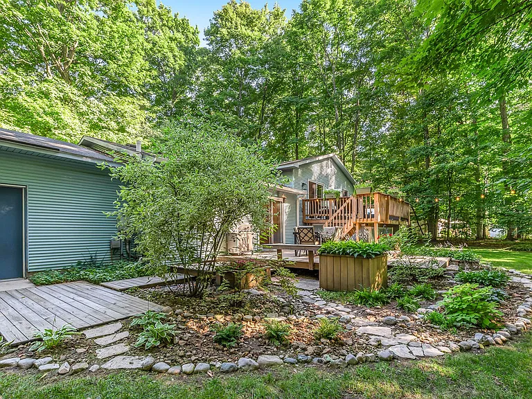 Large, private yard with landscaping