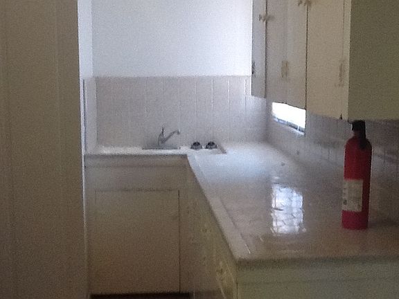 Ample kitchen with refurbished counter tops and abundant sto