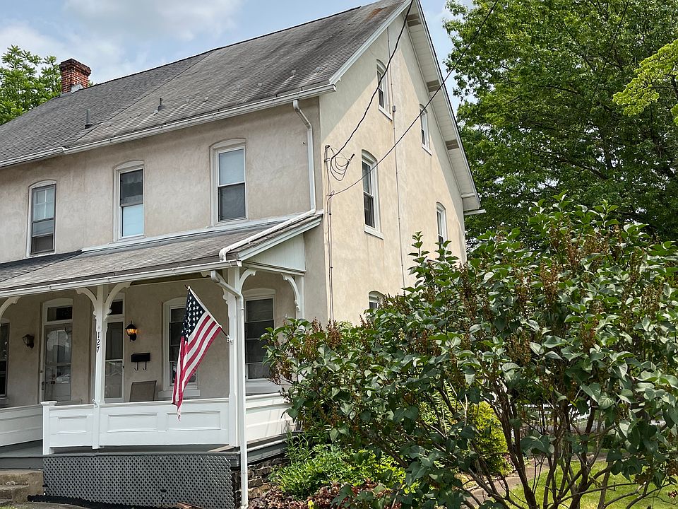 Spacious side yard and front porch, off street parking in addition to private parking space in back of home