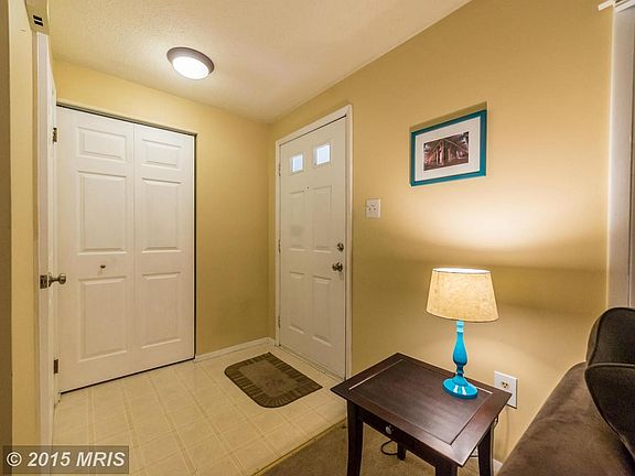 Inviting foyer with coat closet