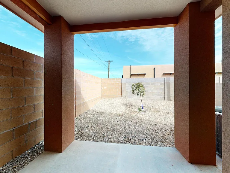 covered patio and private yard. 6' block walls