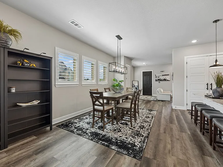 Plenty of natural light fills the kitchen and dining areas