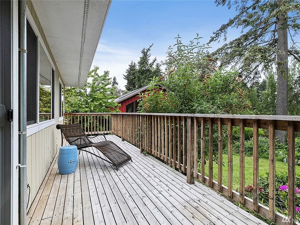 The west facing deck leads to a covered porch which is ideal for entertaining outside year round!