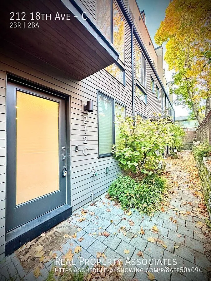 Modern Elegance Meets Urban Comfort Stunning 2 Bed / 2 Bath Townhouse with Rooftop Deck & Gated P... — Photo 4
