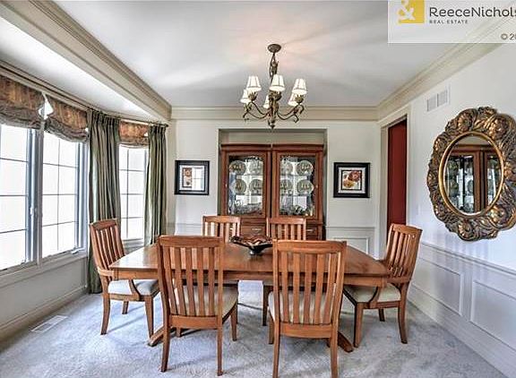 Large formal dining space with new carpet.
