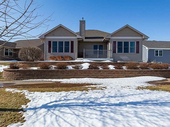 Parade home with  upscale Landscaping Retaining Wall