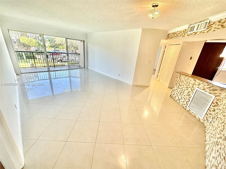 8955 Wiles Rd #208 — Photo 3