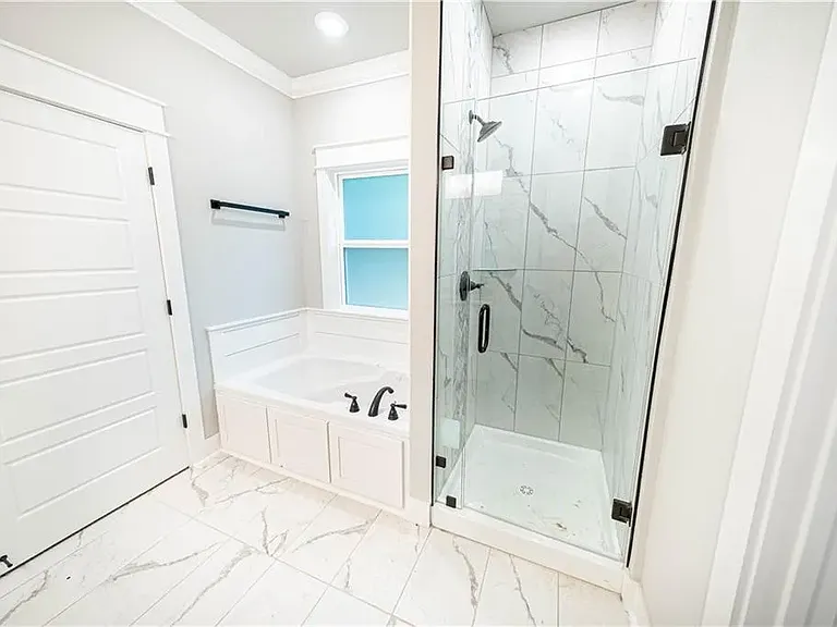 Master Bathroom with Jacuzzi Bathtub and Walk-In Shower