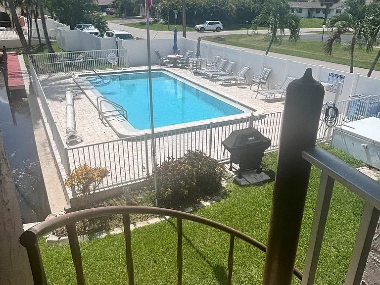View from your private back door down to the pool.