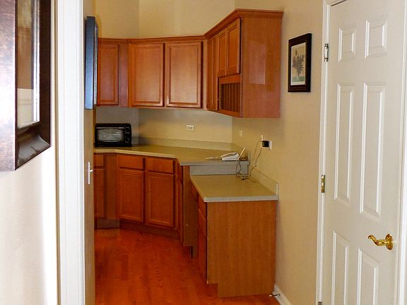 Foyer leads to large kitchen